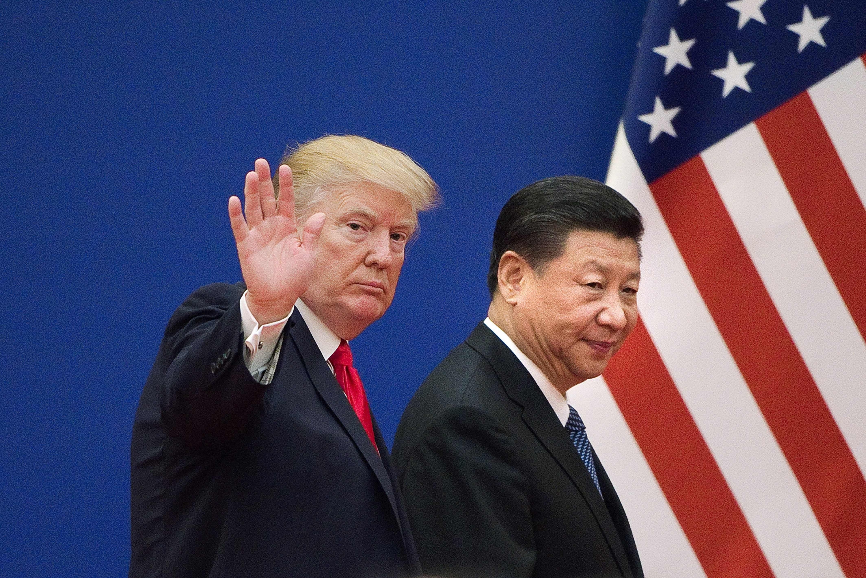 En la imagen, los presidentes Donald Trump y Xi Jinping. (Foto: AFP)